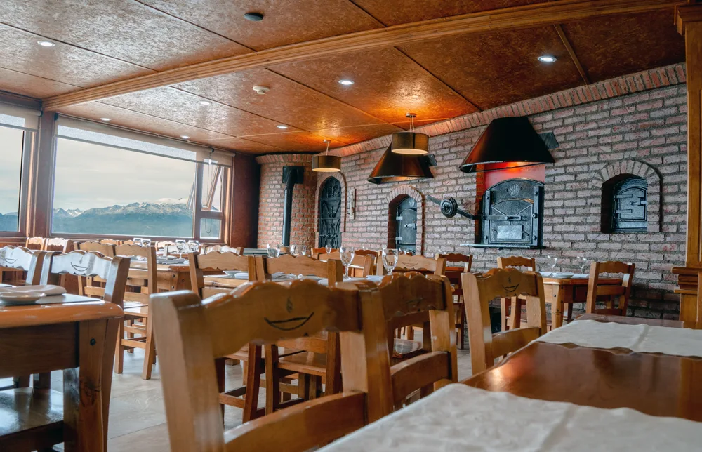 Tables by the windows at Kemú overlooking the Beagle Channel